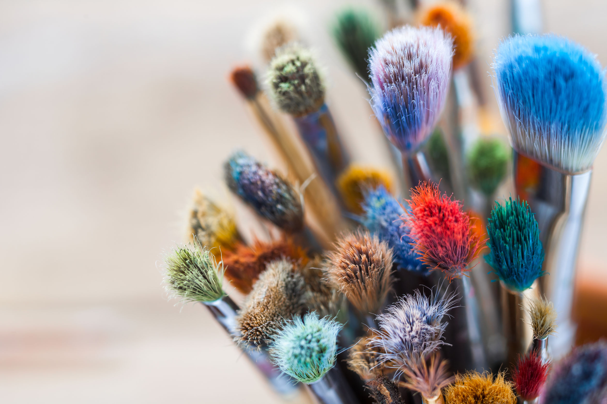 Bunch of artist paintbrushes closeup, selective focus.